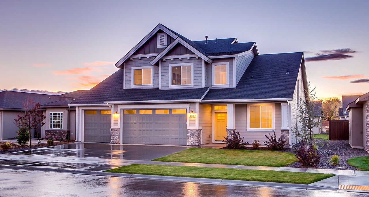 A large home with a spacious driveway